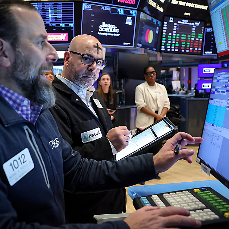 Wall Street ends down as private equity stocks sink - Reuters