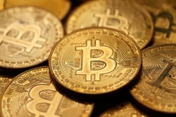 Bitcoin Surges to $74,000 After President Trump Throws Support Behind Key Crypto Bill - Investopedia